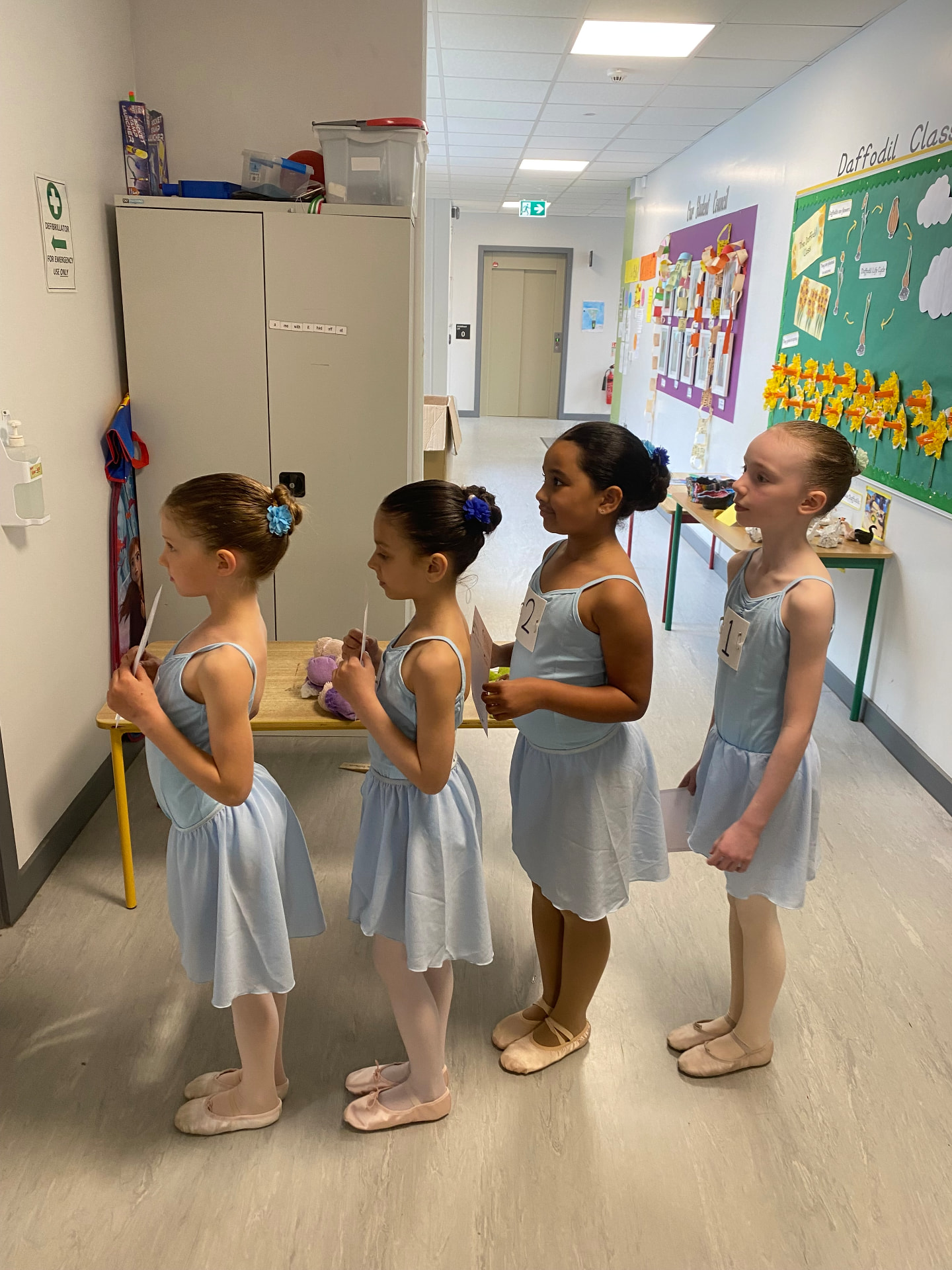 Students lined up for a ballet examination