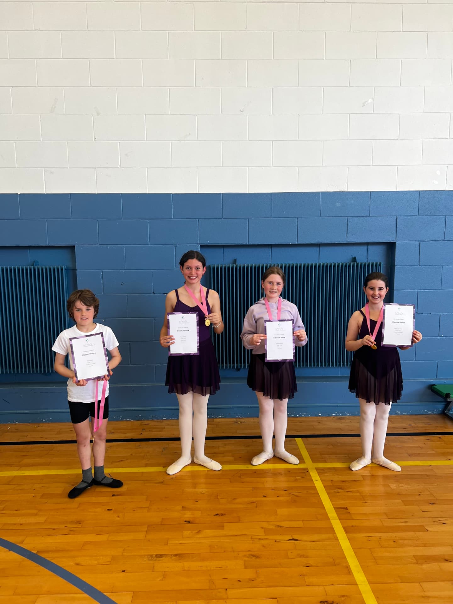 Shanna Muller School of Ballet students with their exam certificates and medals